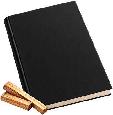 Black journal, styled with palo santo