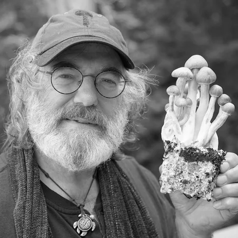 Paul Stamets holding mushrooms