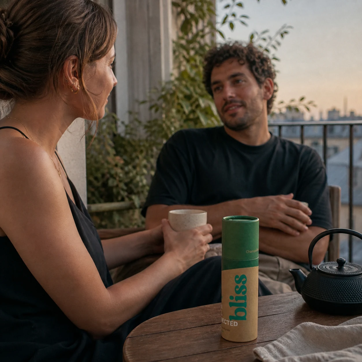 Friends sharing tea with Bliss 2.0 during an evening wind-down ritual